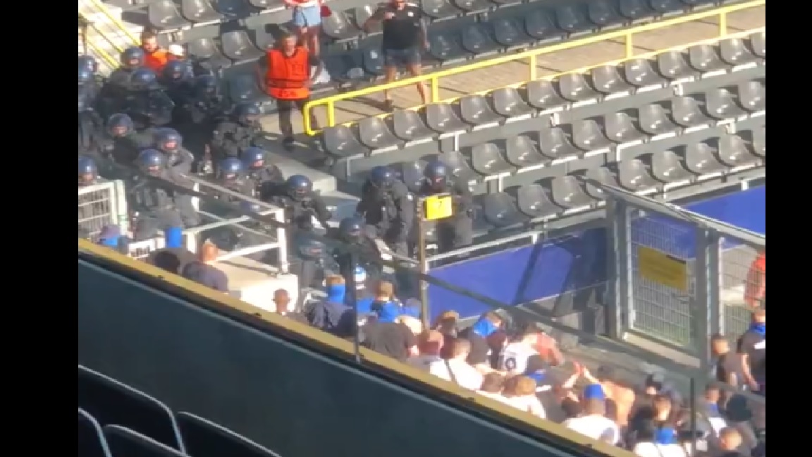 Gorąco przed meczem Ligi Mistrzów. Jeden z piłkarzy omal nie dostał racą, kibice starli się z policją [WIDEO]