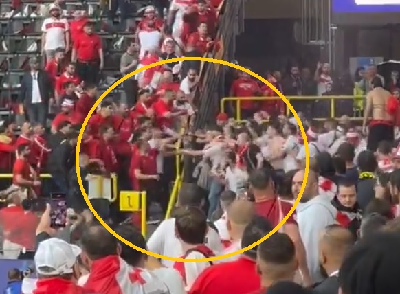Z dachu się leje, a na stadionie się leją. Zadyma przed meczem EURO [WIDEO]
